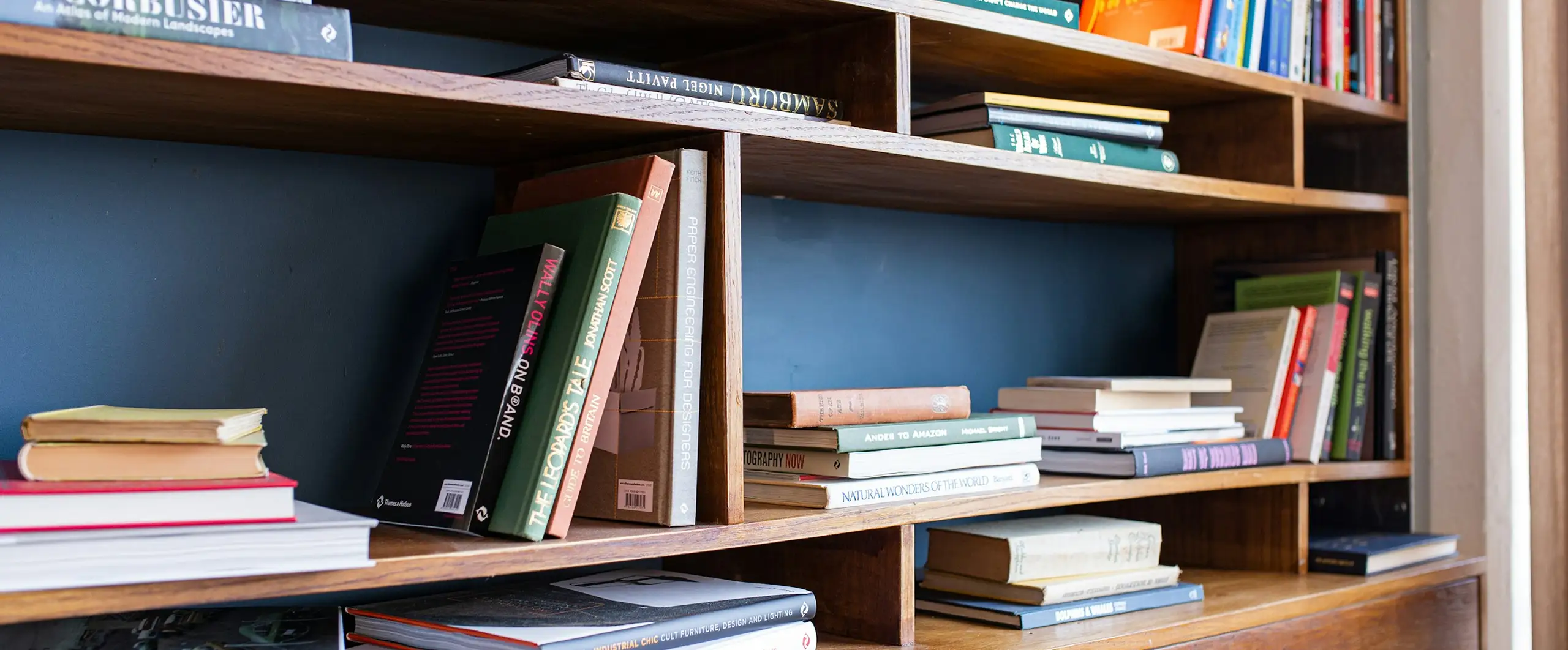 Wooden shelving system for organized book and document storag